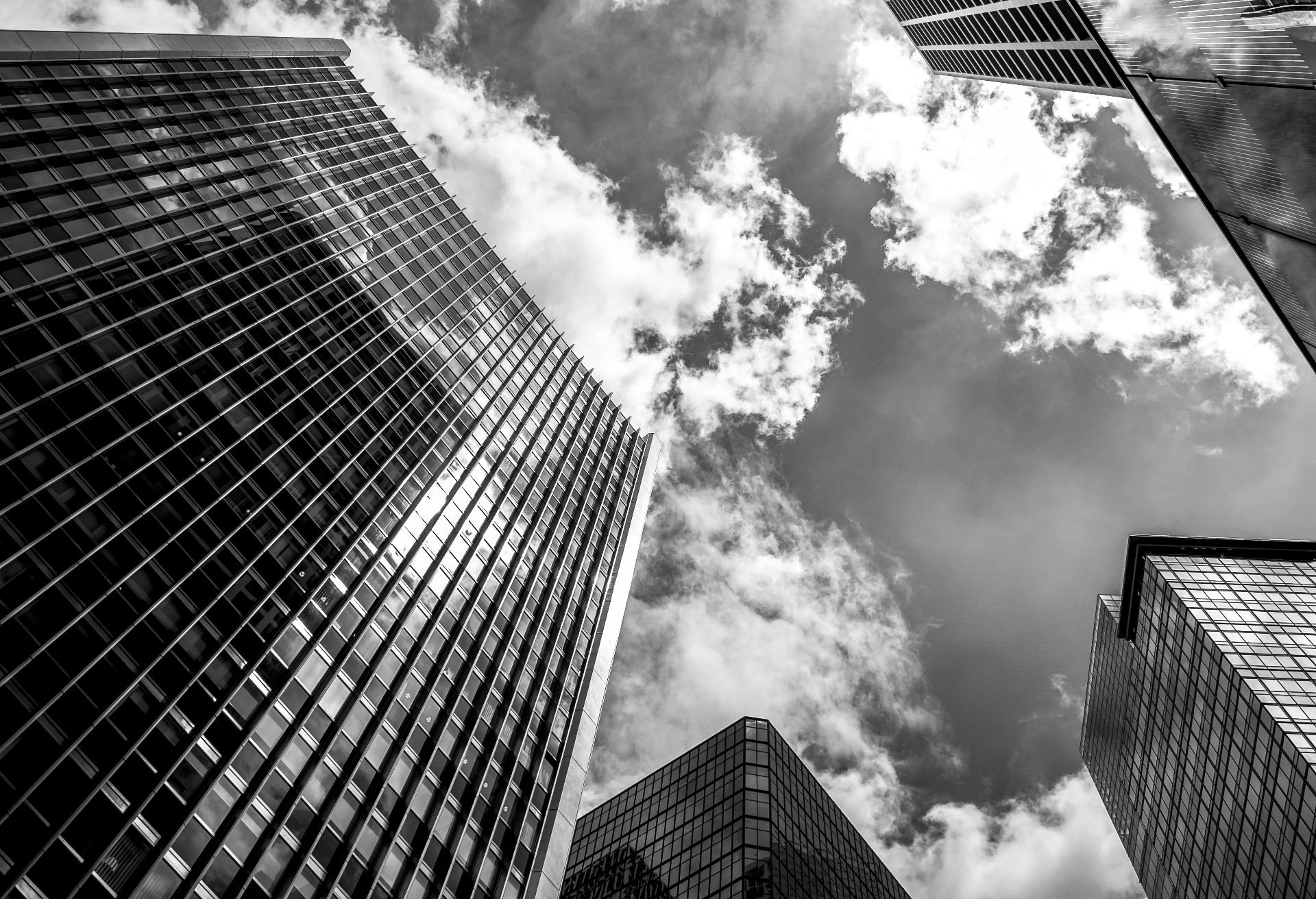 Black and white view of financial district towers — Bitcoin as an asymmetric institutional asset class